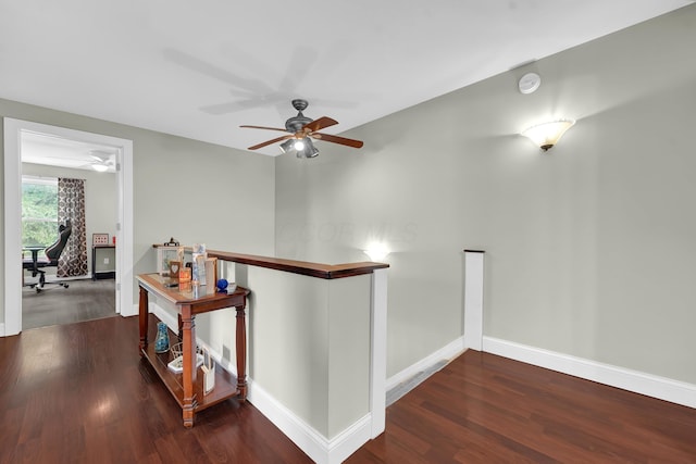 hallway featuring dark hardwood / wood-style floors