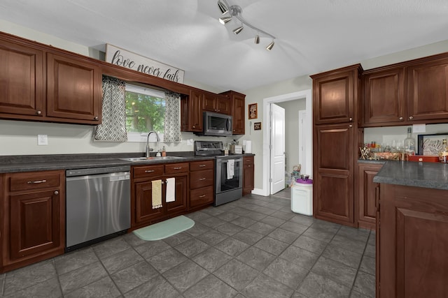 kitchen featuring sink and appliances with stainless steel finishes