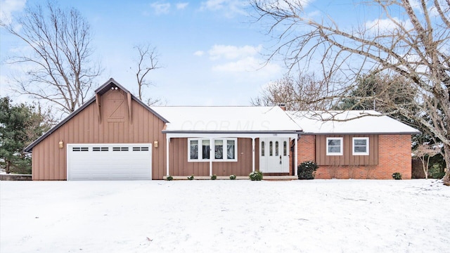 ranch-style house featuring a garage