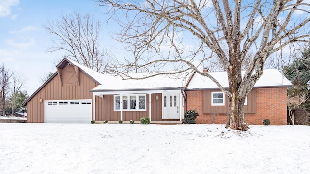 ranch-style house featuring a garage