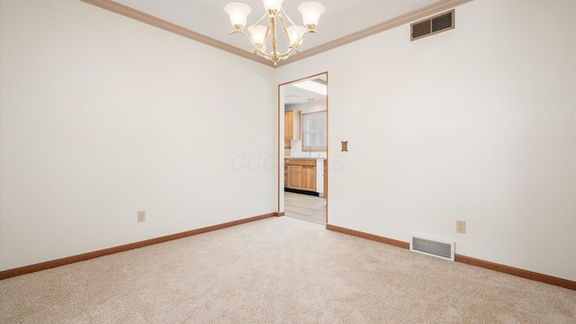 empty room featuring light carpet, sink, ornamental molding, and an inviting chandelier