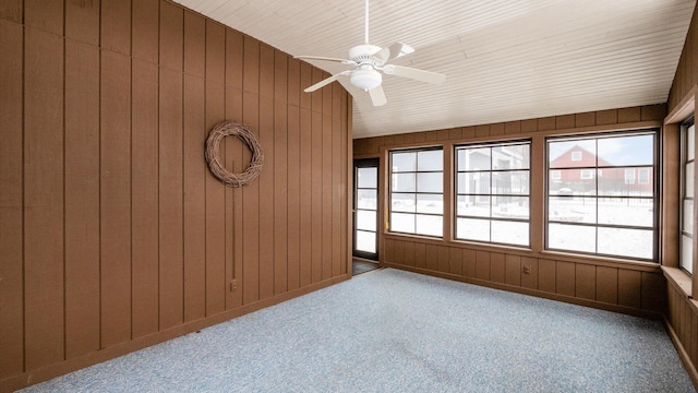 unfurnished sunroom featuring ceiling fan and lofted ceiling