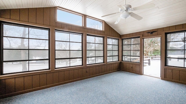 unfurnished sunroom with ceiling fan and lofted ceiling