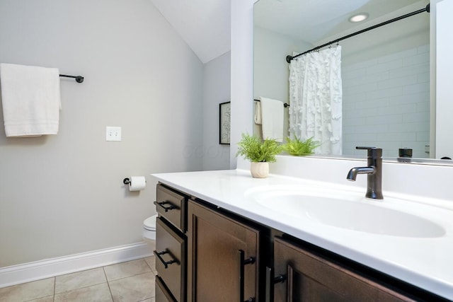 bathroom with tile patterned floors, vaulted ceiling, toilet, vanity, and a shower with shower curtain