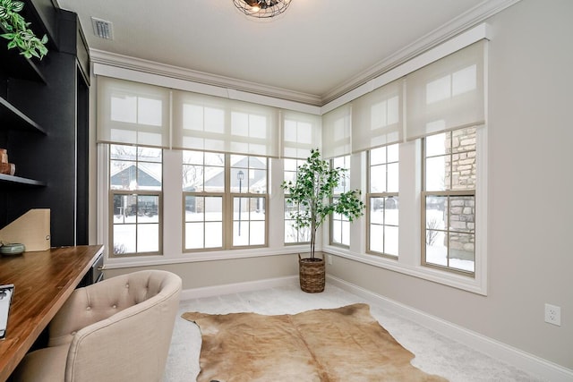 sitting room featuring crown molding and light colored carpet