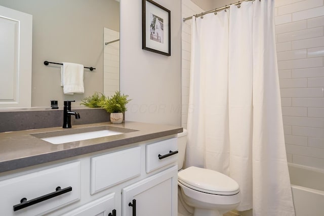 full bathroom with vanity, toilet, and shower / bathtub combination with curtain