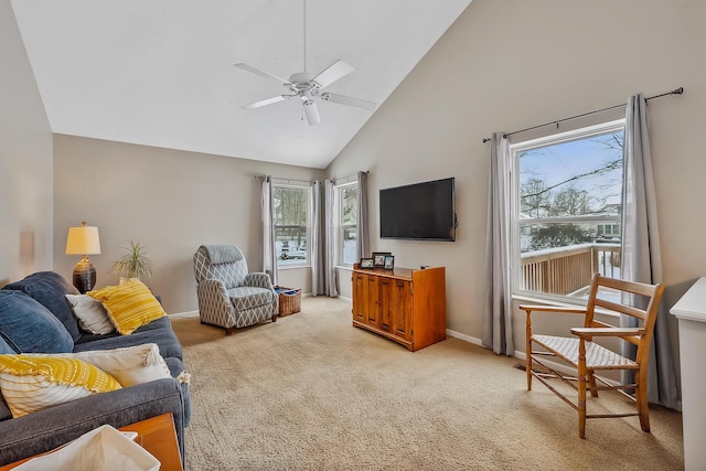 living room featuring ceiling fan, light colored carpet, and high vaulted ceiling