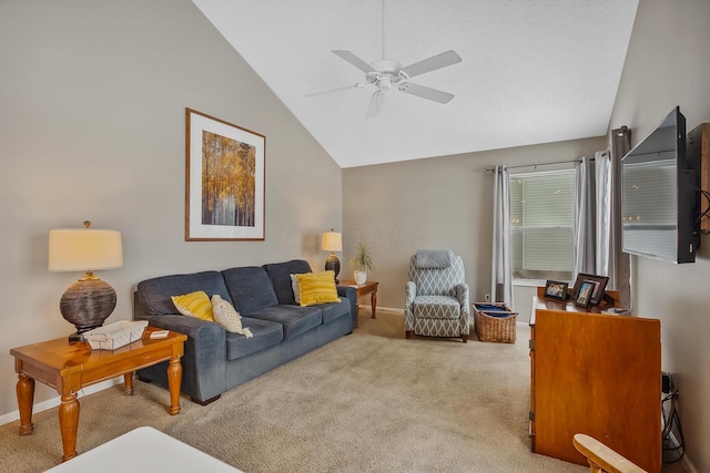 carpeted living room featuring vaulted ceiling and ceiling fan