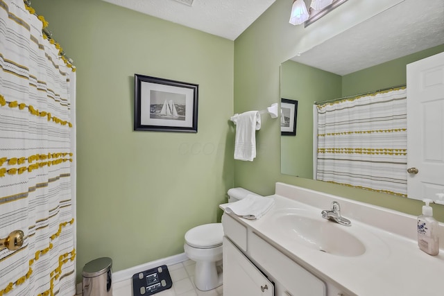 bathroom with a shower with curtain, vanity, a textured ceiling, and toilet