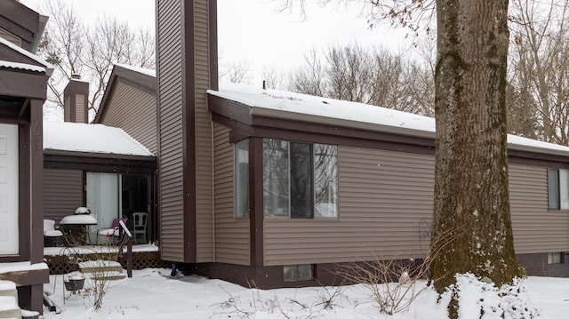 view of snow covered property