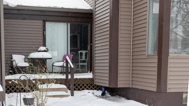 view of snow covered deck