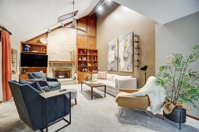 living room with a fireplace, light colored carpet, vaulted ceiling, and built in features