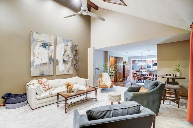 living room with vaulted ceiling and ceiling fan