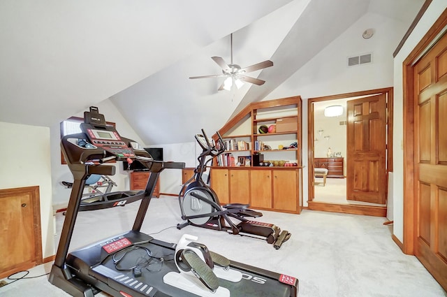 workout room featuring light carpet, vaulted ceiling, and ceiling fan