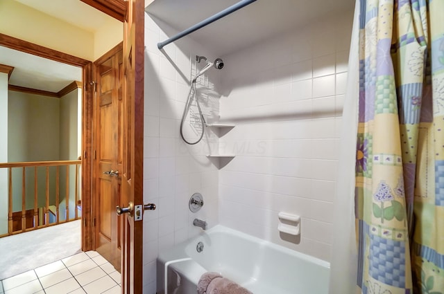 bathroom featuring crown molding and shower / tub combo