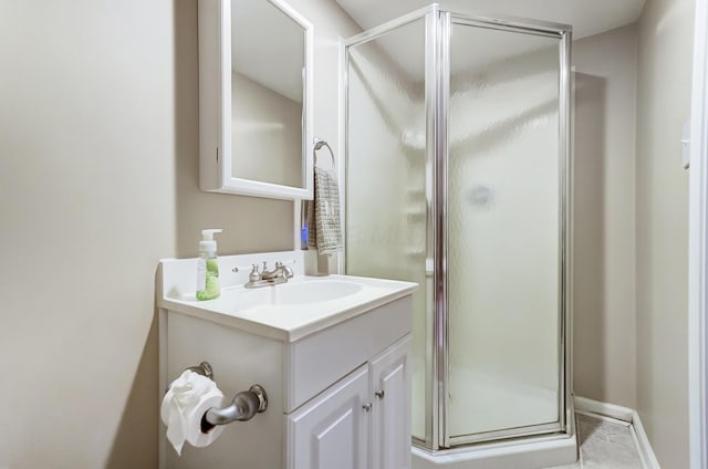 bathroom featuring vanity and walk in shower