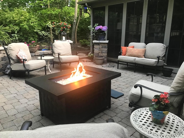 view of patio / terrace with a fire pit