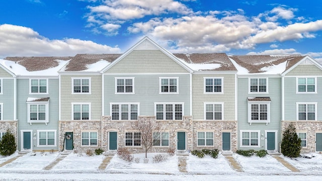 view of snow covered property