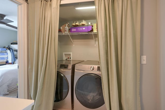 laundry area with separate washer and dryer and ceiling fan