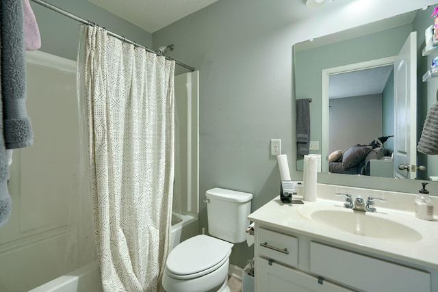 full bathroom with toilet, vanity, and shower / tub combo with curtain