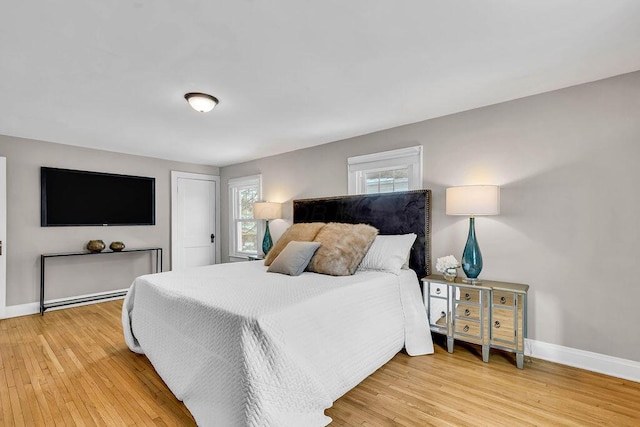 bedroom with light hardwood / wood-style flooring