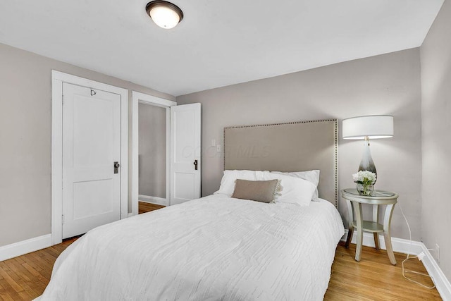 bedroom featuring wood-type flooring