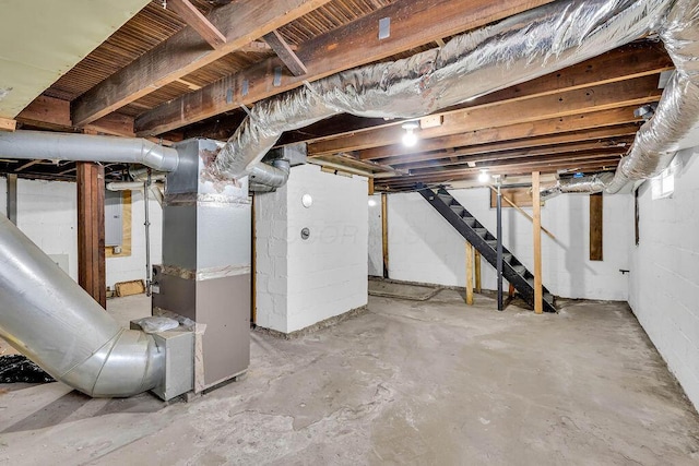 basement featuring heating unit