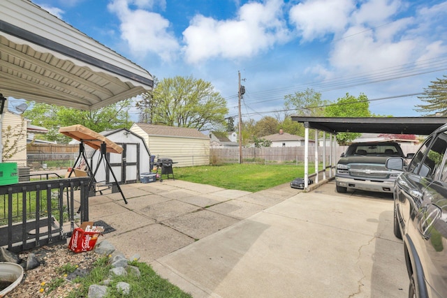 view of patio / terrace featuring area for grilling and a storage shed