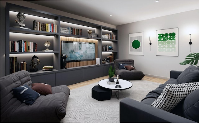 living room featuring wood finished floors, built in shelves, and baseboards