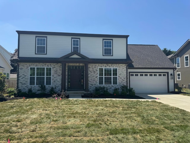 3509 Redding Rd, Upper Arlington, OH 43221 - view of front of house with an attached garage, driveway, and brick siding
