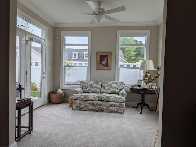 sunroom featuring ceiling fan