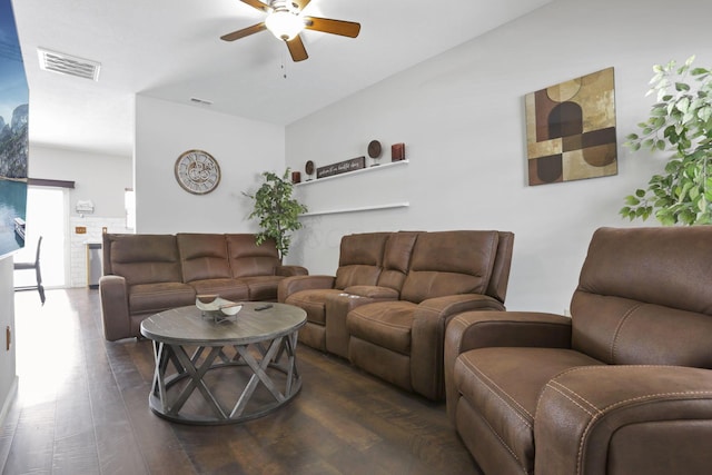 living room with dark hardwood / wood-style floors and ceiling fan