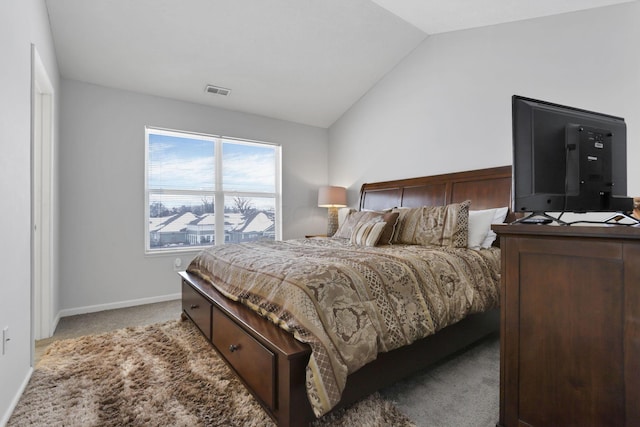 bedroom featuring light carpet and lofted ceiling