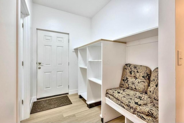 mudroom with light hardwood / wood-style flooring