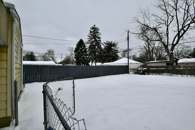 view of yard covered in snow