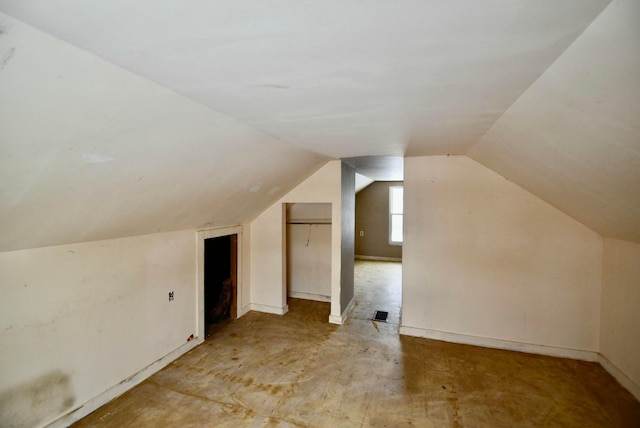 bonus room with lofted ceiling