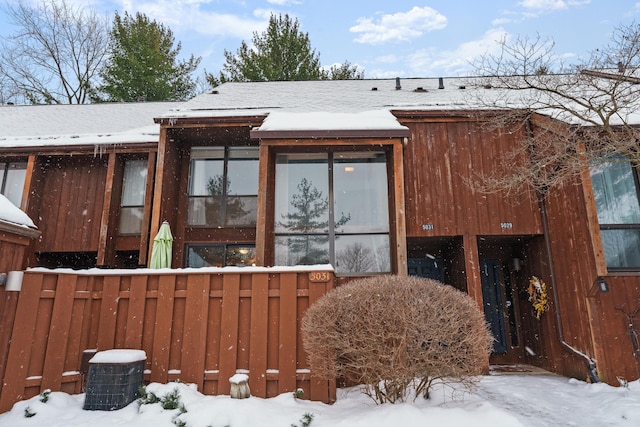 view of snow covered house