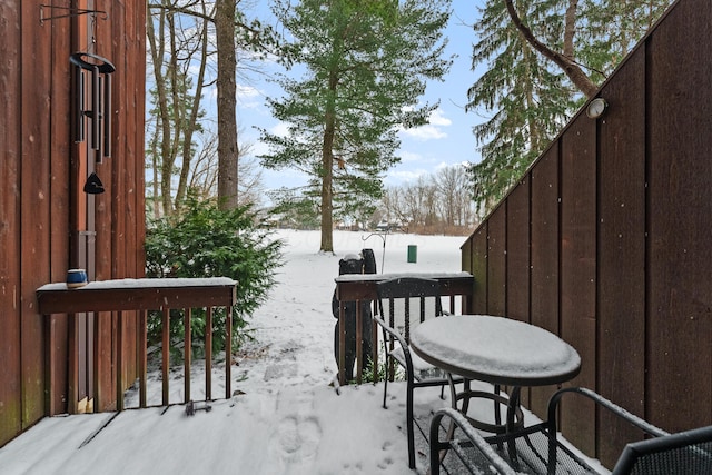 view of snow covered deck