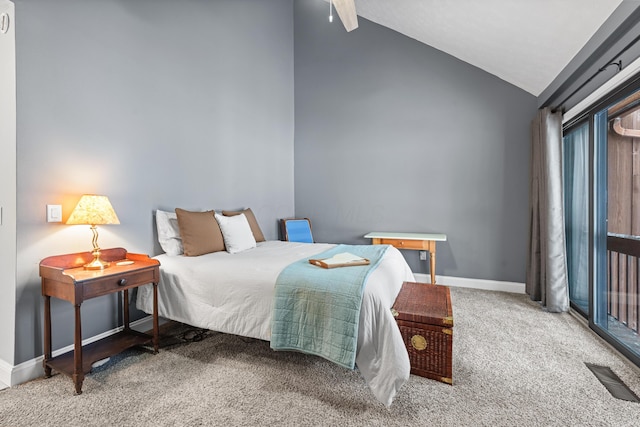 bedroom featuring carpet floors and vaulted ceiling