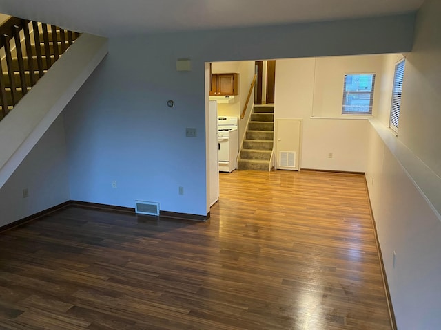 interior space with dark hardwood / wood-style flooring