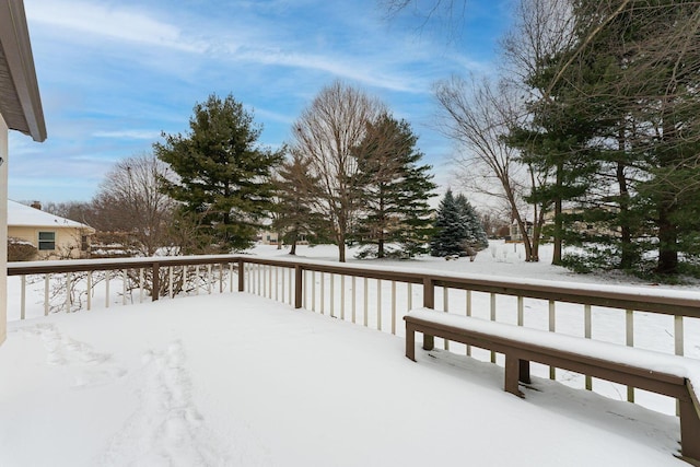 view of snow covered deck