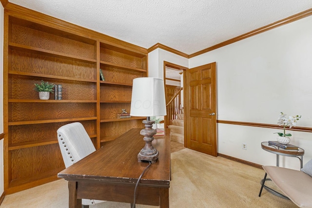 carpeted office featuring a textured ceiling and crown molding