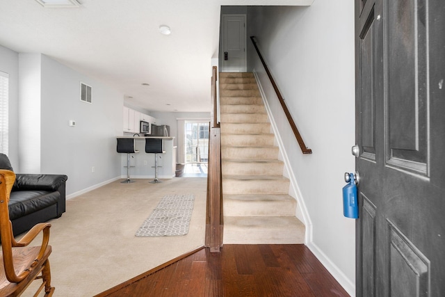 foyer with hardwood / wood-style flooring