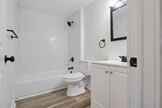 full bathroom featuring vanity, toilet, and washtub / shower combination