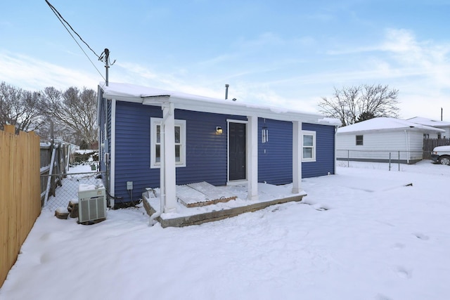 view of front of house featuring central air condition unit