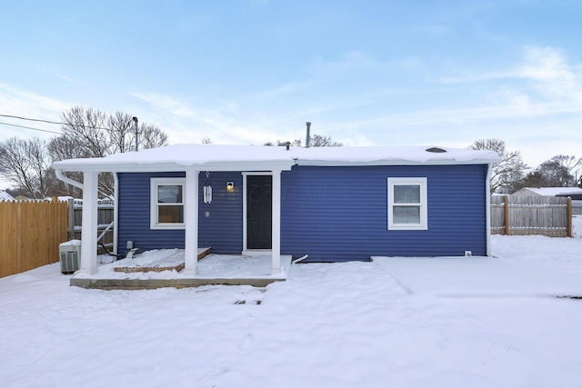 view of front of property featuring cooling unit