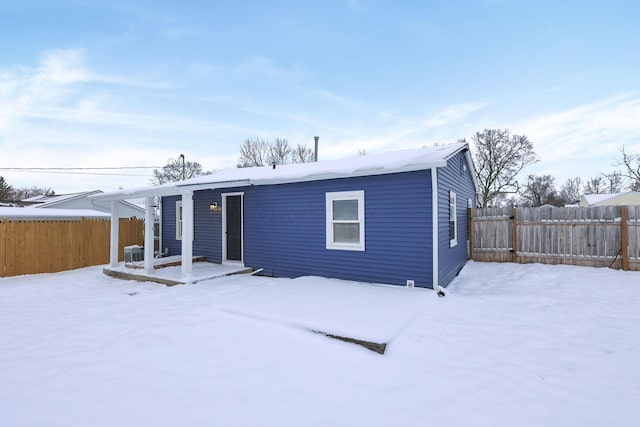 view of front of property featuring central AC unit