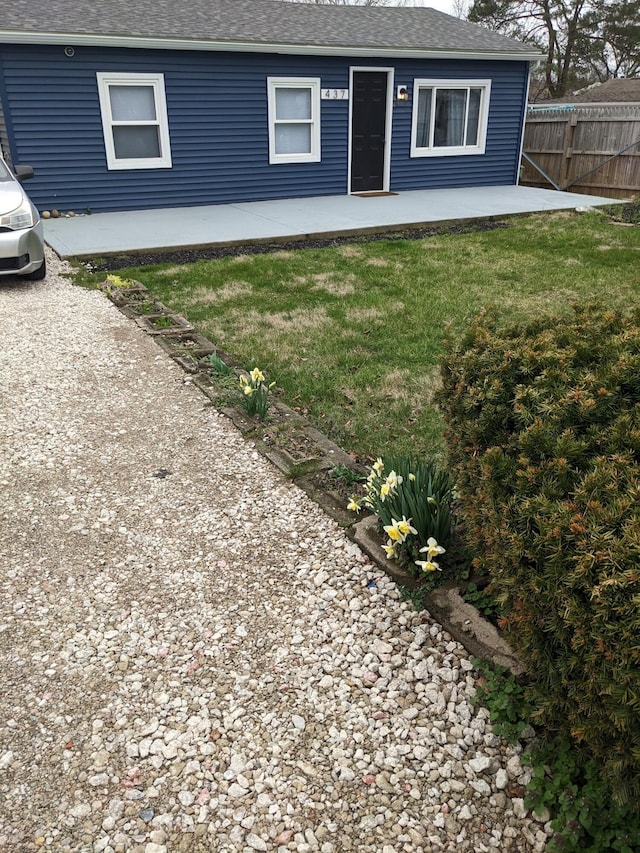 exterior space with a yard and a patio