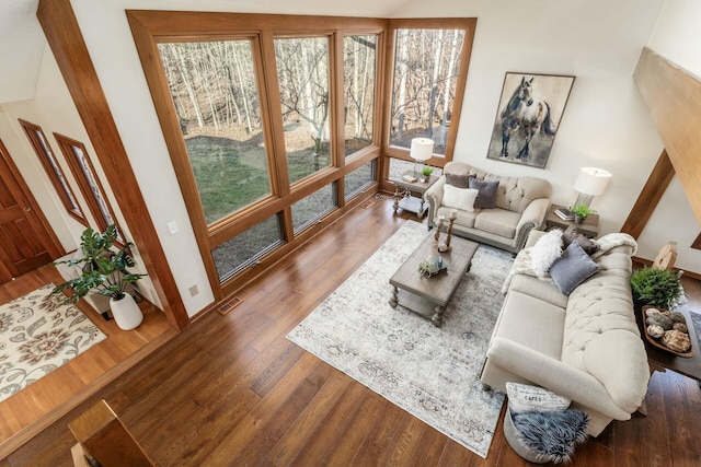 living room featuring dark hardwood / wood-style flooring