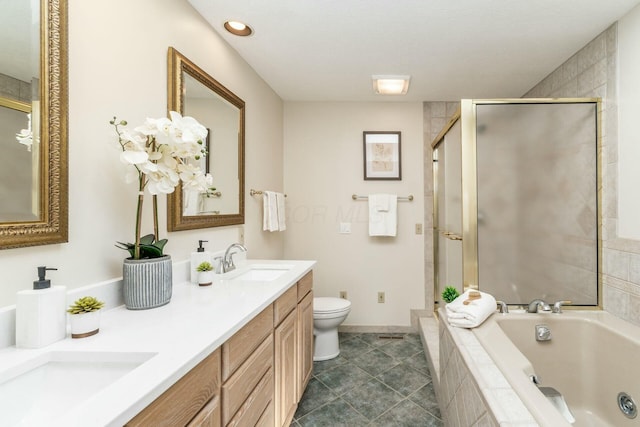 full bathroom with toilet, vanity, and shower with separate bathtub